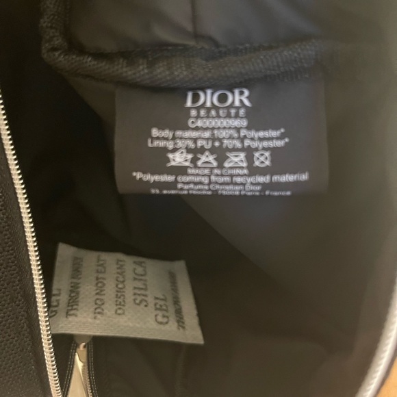 Dior black “CD” raised emblem silver & pearl wristlet & carriage keychain